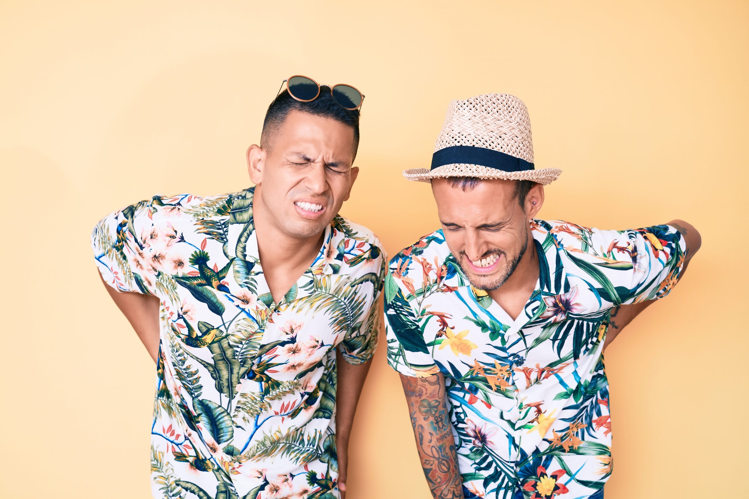 two colourful guys with sore backs
