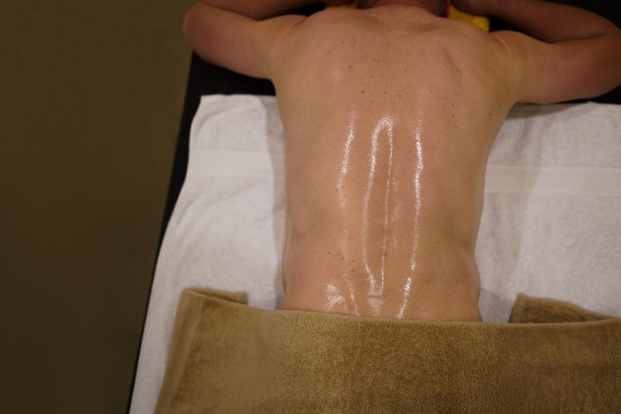 man on massage table